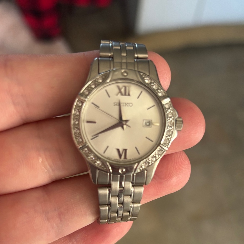 Seiko Silver Timepiece with White Face
